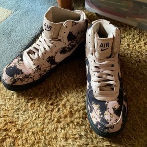 These are a bleached pattern pair of Nike Air Force 1s.